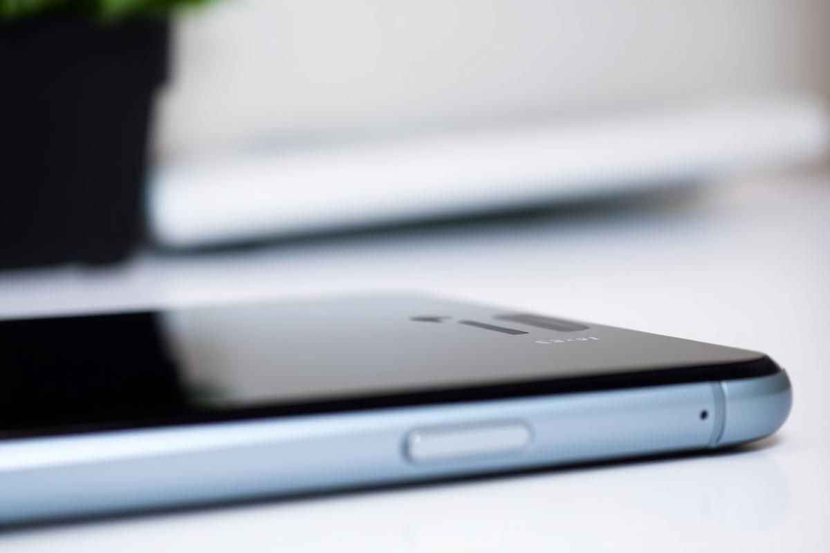 An abstract image of a technical error message on a smartphone, symbolizing app compliance issues in a professional context.